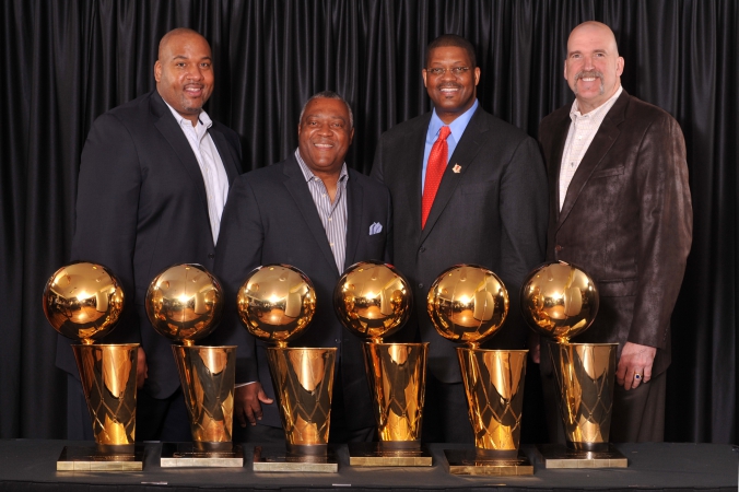 Former Chicago Bulls pose with six NBA trophies, private corporate event photography with 8x10 onsite printing, united center, chicago