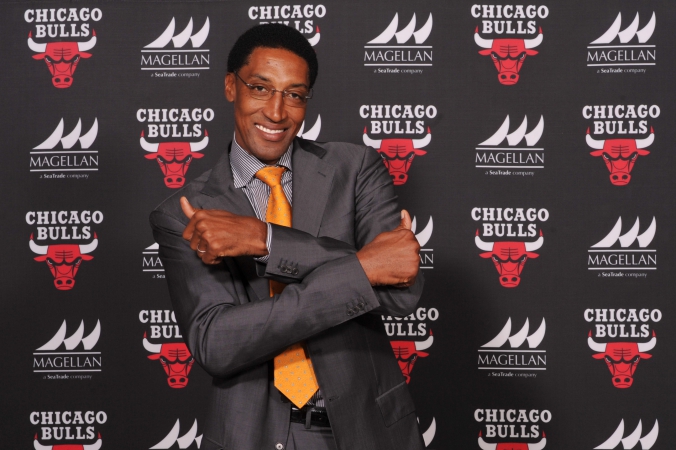 NBA legend Scottie Pippen poses on the step and repeat, private corporate event photography, united center, chicago