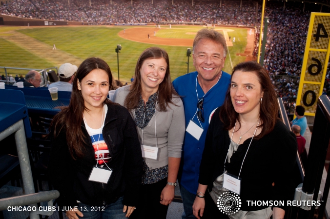 Group photo at Thomson Reuters private Cubs rooftop event.