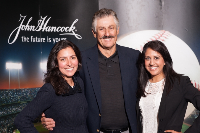 celebrity pitcher rollie fingers poses for photo with guests at john hancock booth, mccormick place chicago tradeshow