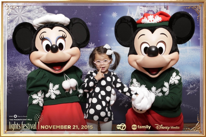 Mickey and Minnie pose with children at Disney and ABC Family sponsored step and repeat photography event, 2015 Festival of Lights, Chicago, Hotel Intercontinental